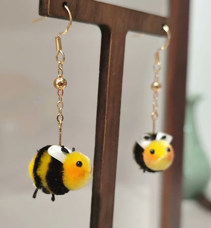 Handmade Ronghua little bumblebee drop earrings in yellow-black mulberry silk velvet with white wings on gold hooks