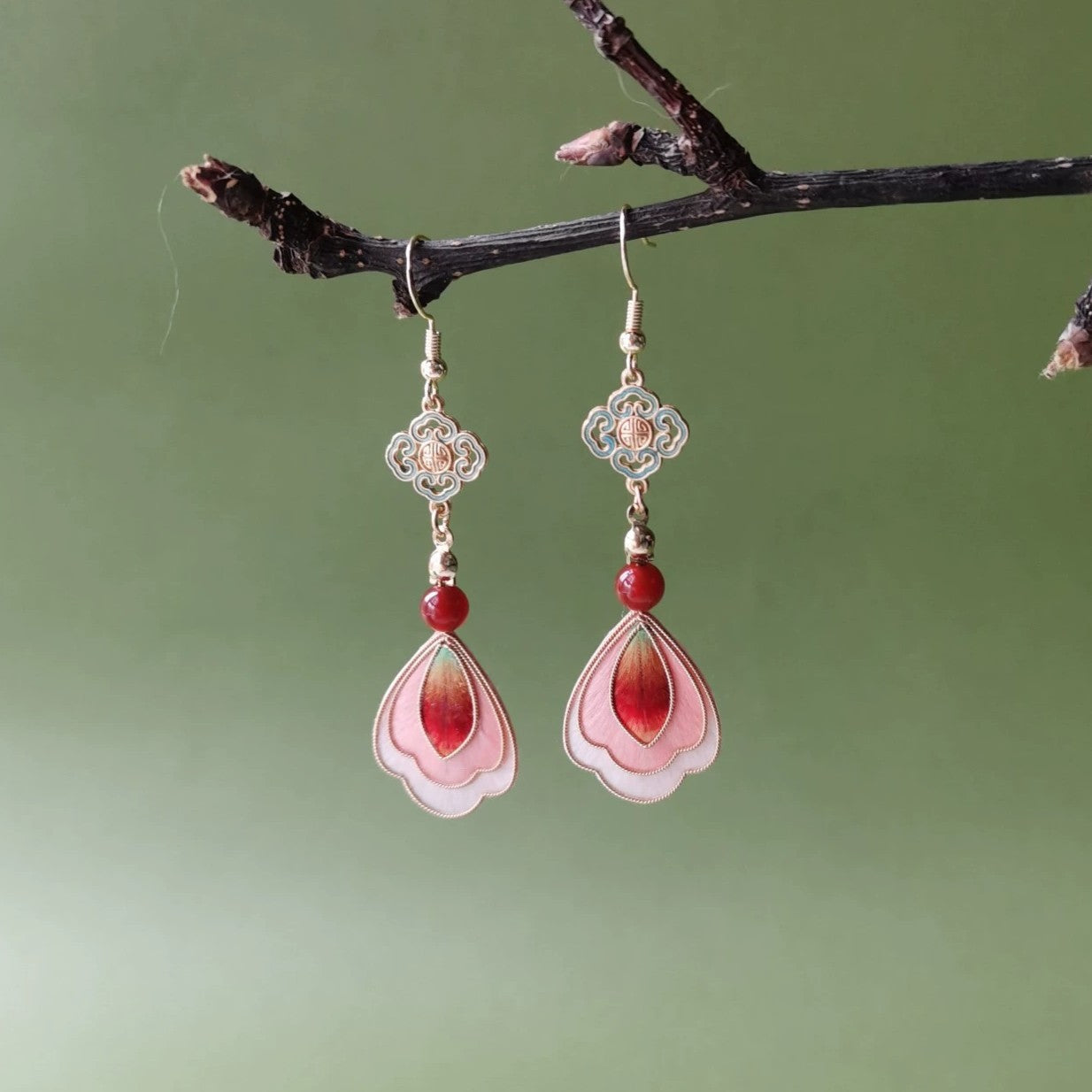 Handmade Ronghua Dunhuang-style drop earrings in pink-red mulberry silk velvet with turquoise cloisonné charm and red agate bead