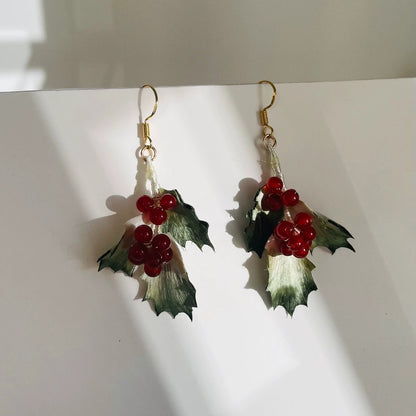 Handmade Ronghua winter holly drop earrings in green mulberry silk velvet leaves with red berry clusters on gold hooks