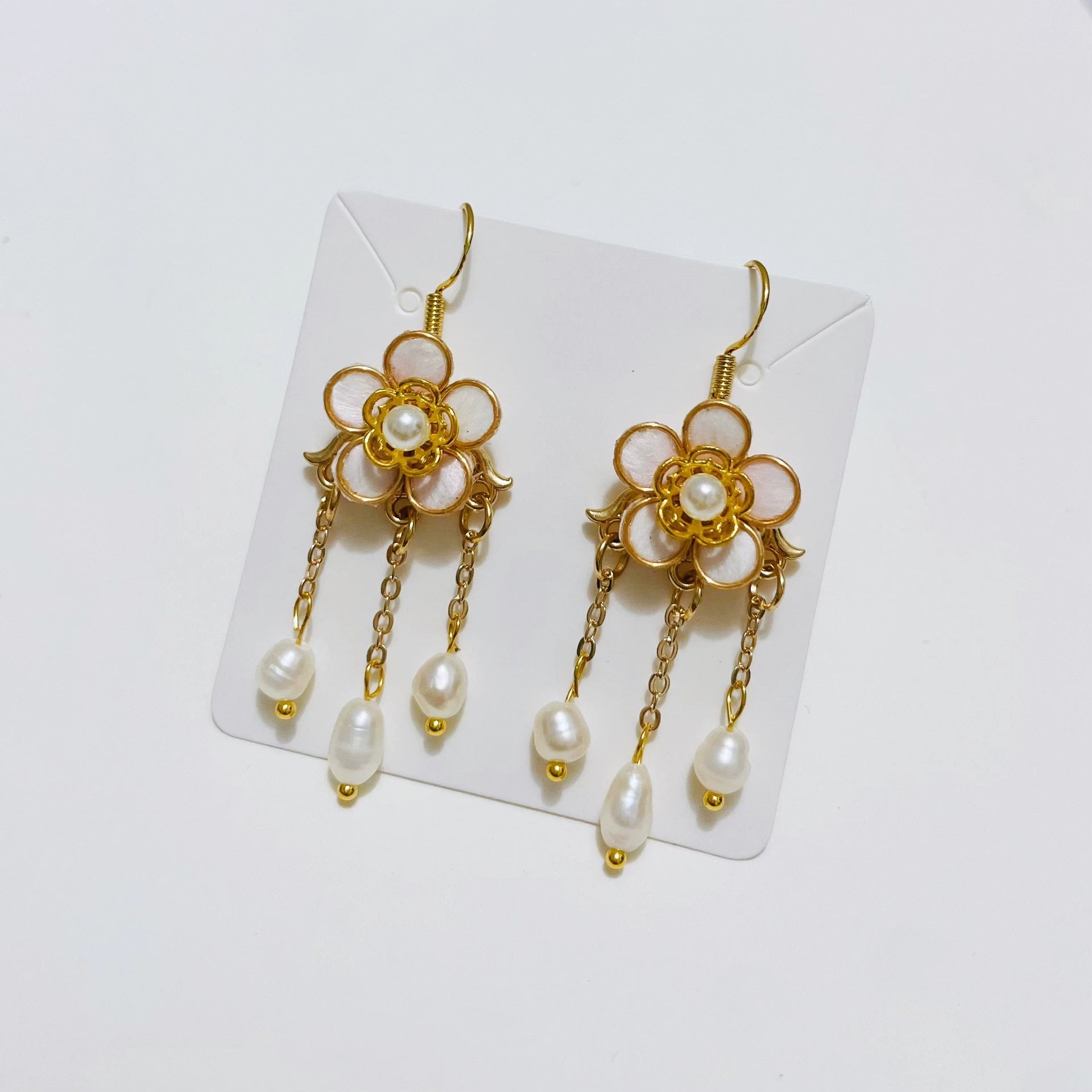 Handmade Ronghua pink plum blossom long tassel earrings in mulberry silk velvet with pearl center and gold chain drops