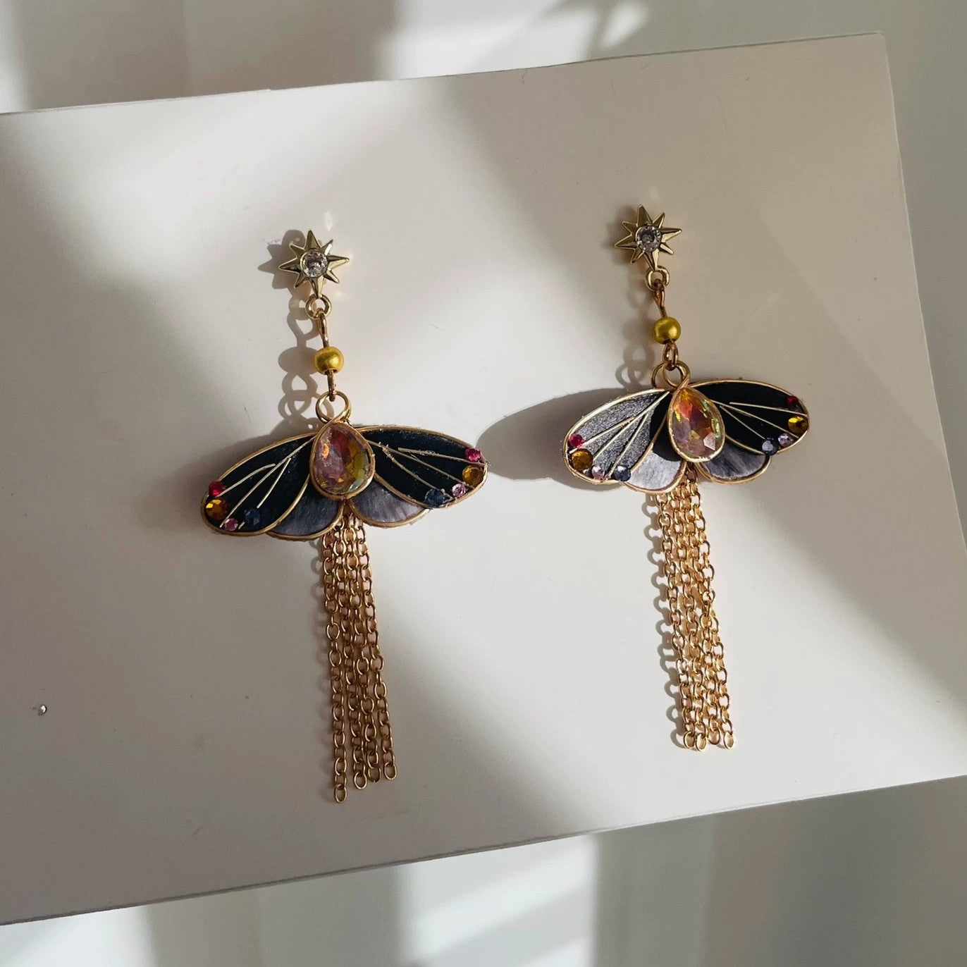 Handmade Ronghua midnight-blue silk velvet butterfly tassel earrings with colorful crystal accents and long gold chain drops