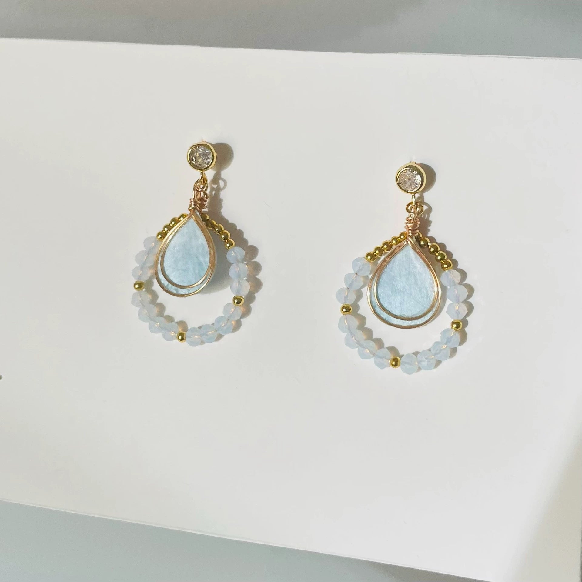 Handmade Ronghua aquamarine teardrop drop earrings in mulberry silk velvet with crystal bead circle and gold details