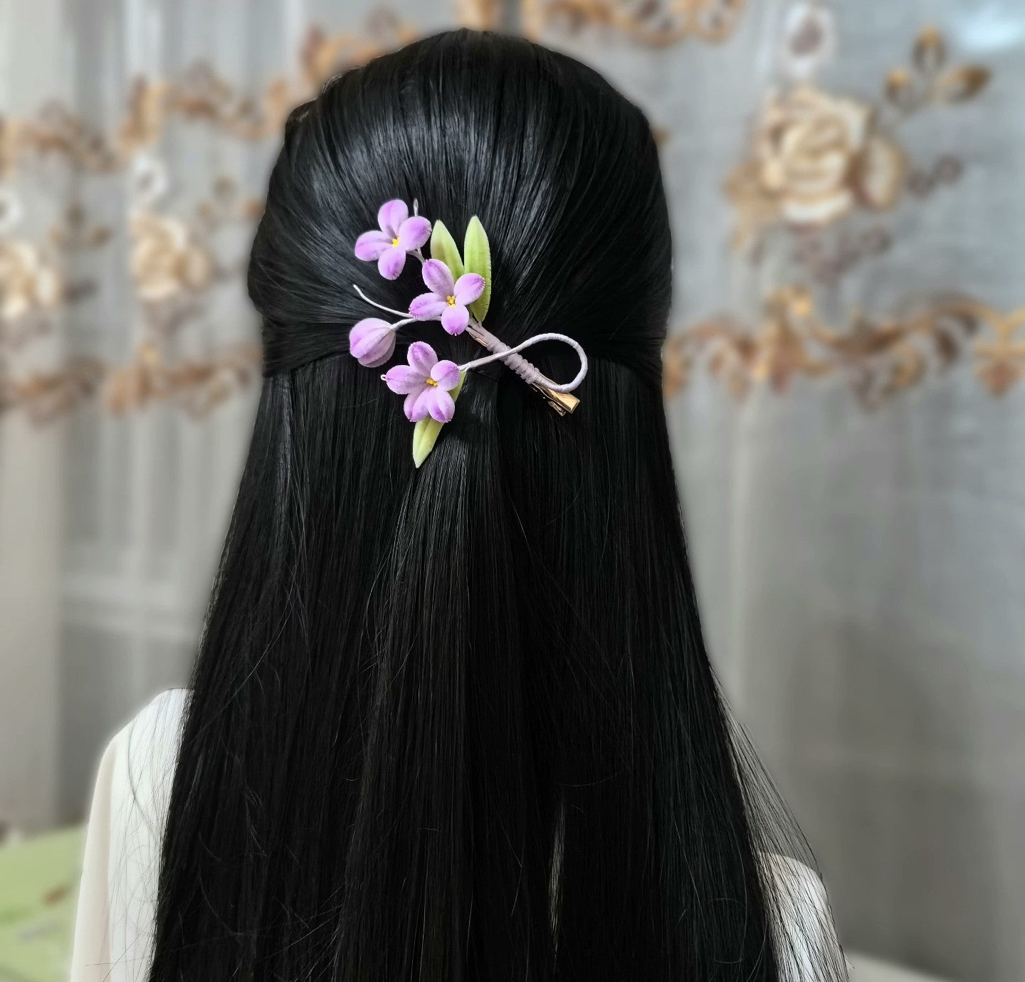 Handmade Ronghua purple lilac flower hair clip worn in black hair – natural mulberry silk velvet floral alligator clip