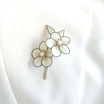 Handmade Ronghua white anime flower brooch – ivory mulberry silk velvet blossoms with black outline