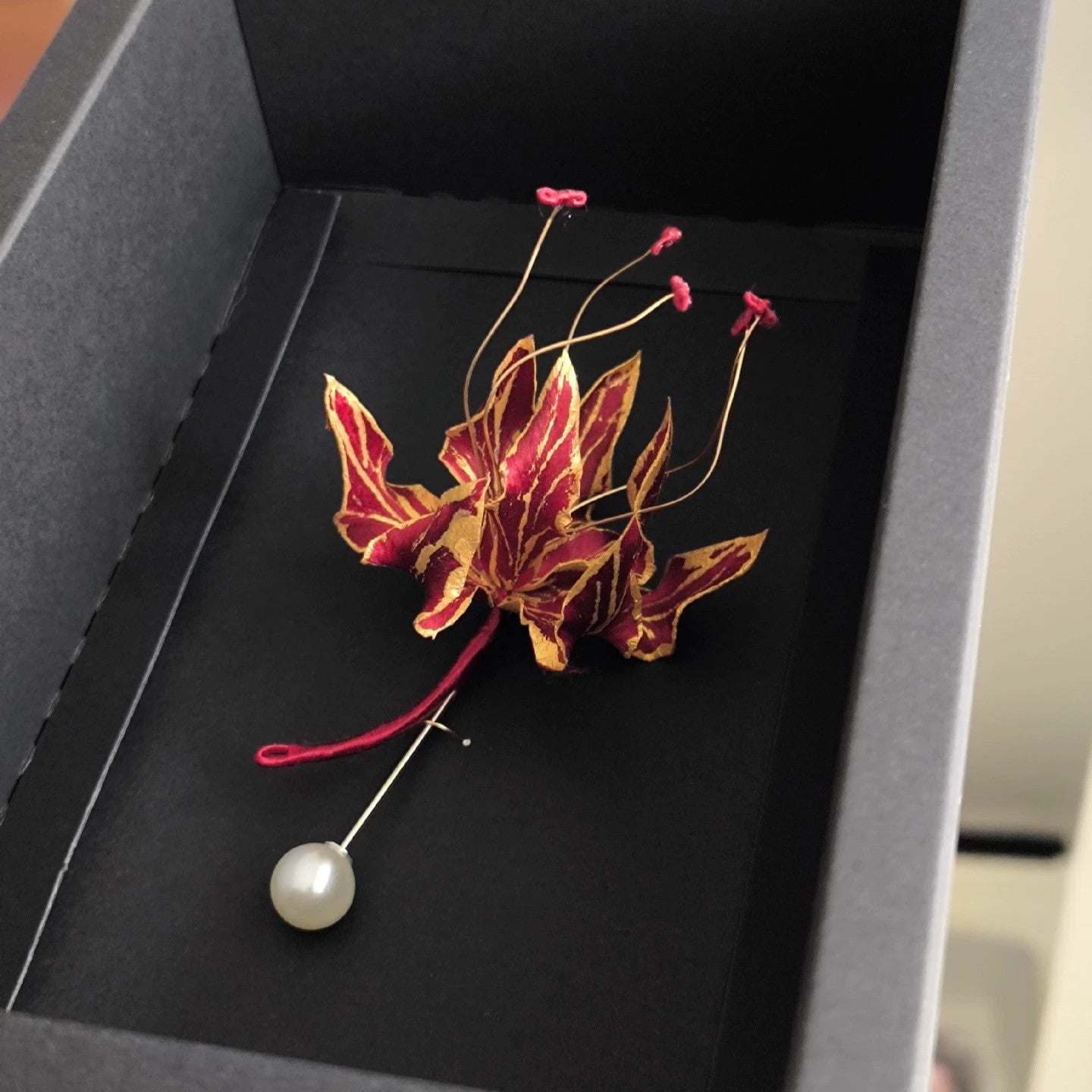 Handmade Ronghua red-gold gloriosa lily brooch with pearl – mulberry silk velvet flame lily pin
