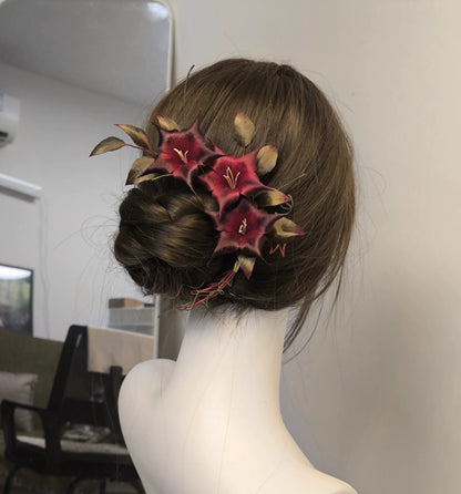 Ronghua Sylus datura hairpin worn in low bun – lightweight silk floral accessory for cosplay and dark hanfu